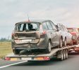 car-trailer-is-being-towed-by-tow-truck