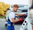 handsome-middle-age-man-working-towing-service-road-roadside-assistance-concept